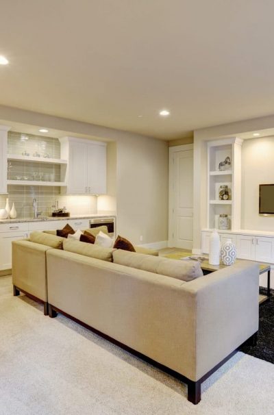 Chic Basement Living Room With Wet Bar
